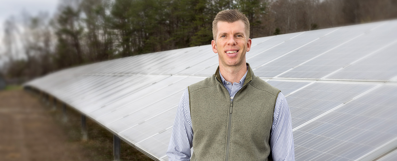 Ed Rottmann with solar panels